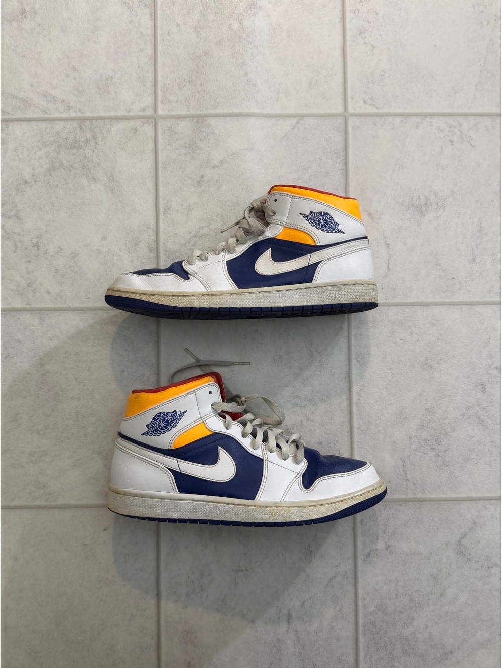 Jordan white blue and yellow high top sneakers